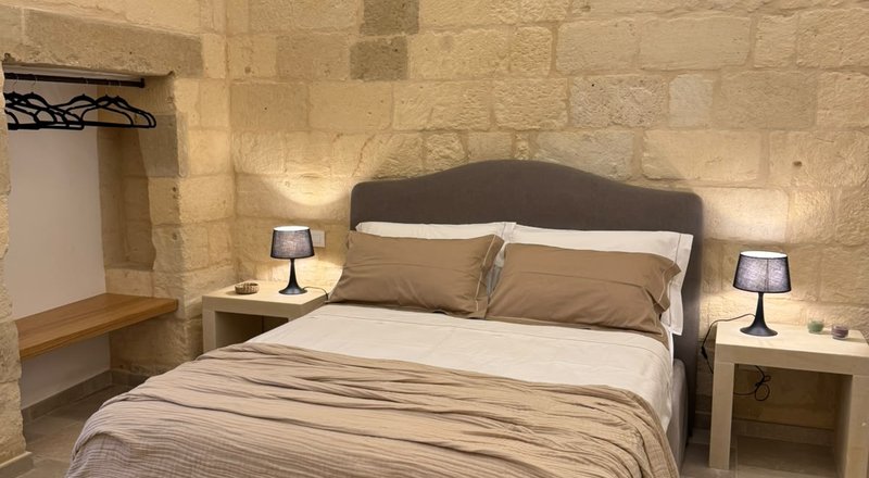 La camera da letto dell'appartamento La Rimesa