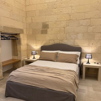 La camera da letto dell'appartamento La Rimesa