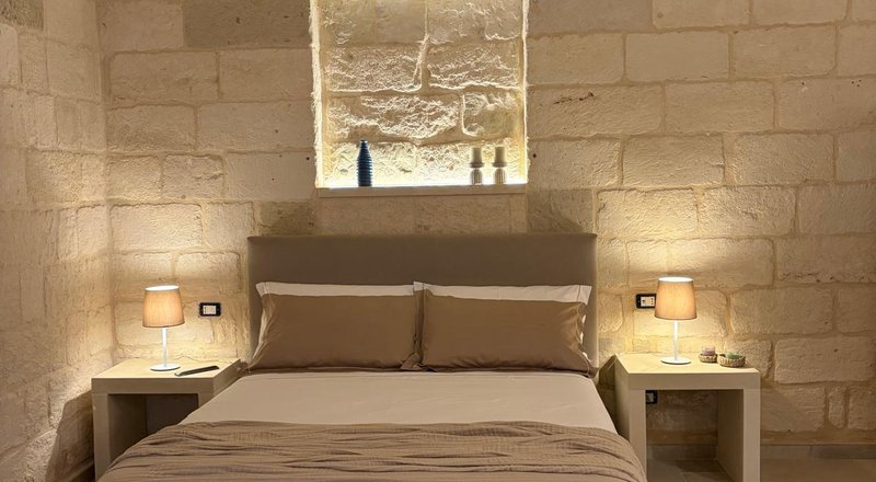 La camera da letto dell'appartamento Lumera