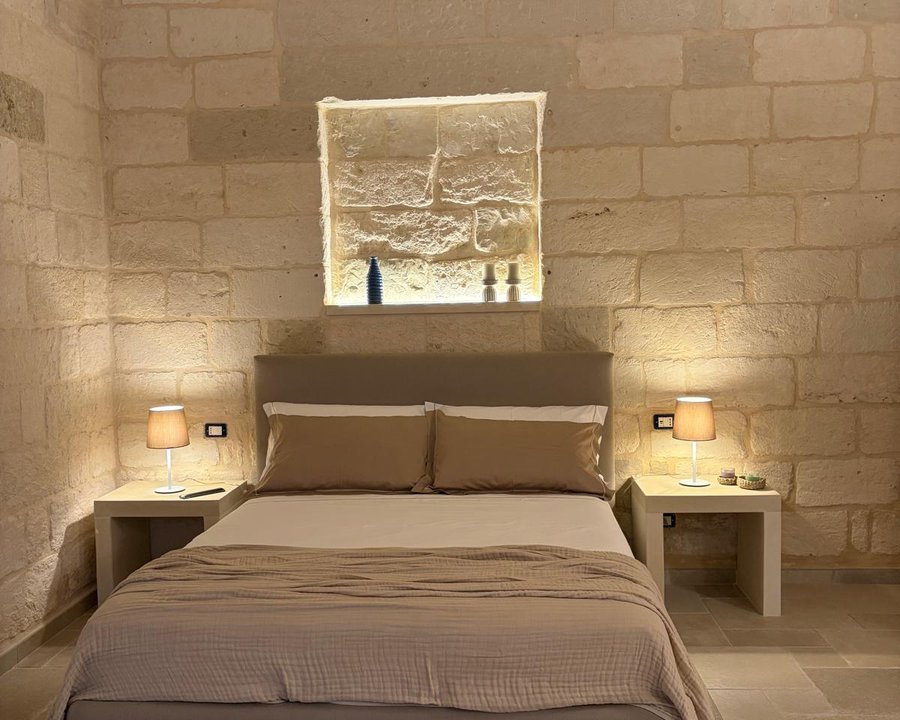 La camera da letto dell'appartamento Lumera