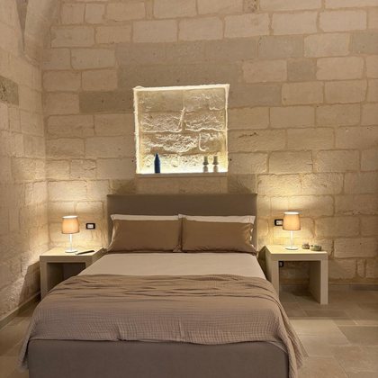 La camera da letto dell'appartamento Lumera
