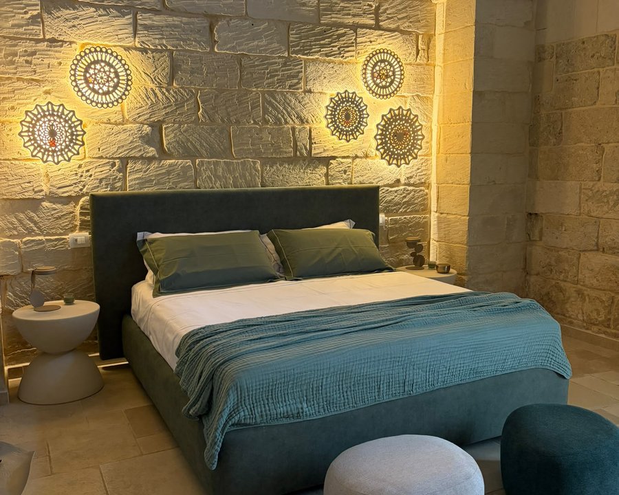 La camera da letto dell'appartamento Malìa
