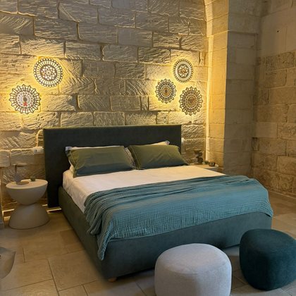 La camera da letto dell'appartamento Malìa